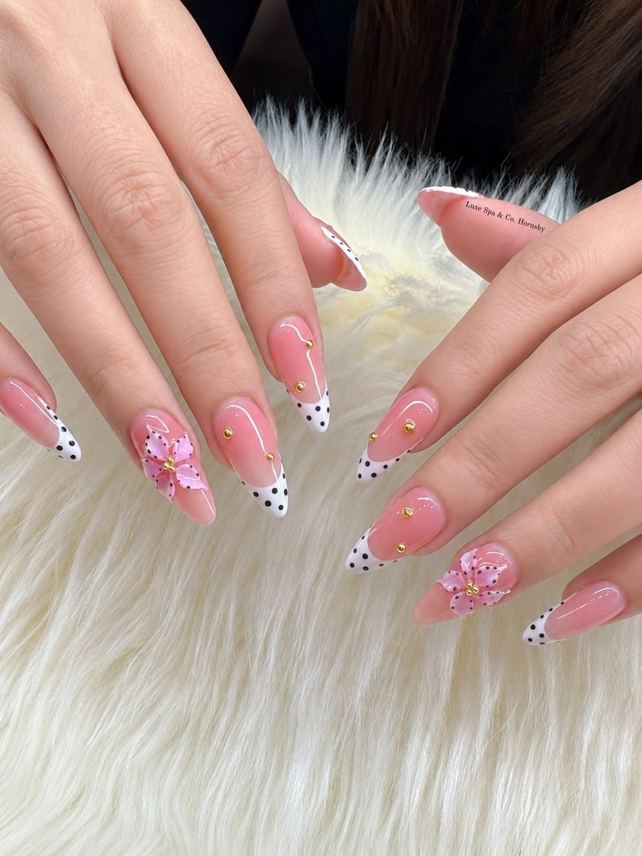 Pink nails with playful dot art